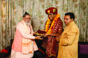 25. With Mahant Sri Sri Rameshwar Puriji Maharaj from Kashi Annapurna Temple and Acharya Pandit Sri Dr. Ramnarayan Dwivedi from Kashi, Varanasi
