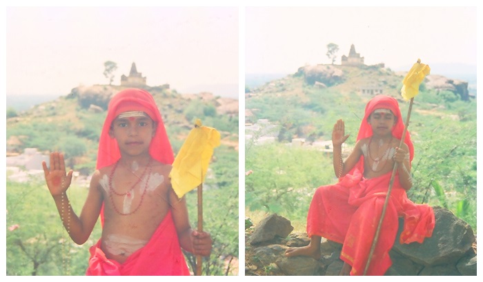 Year 1988 (approximately). These two photographs of Paramahamsa Nithyananda when he was around 10 years of age, have been taken by photographers S. Sethu and Kannayiram of Tiruvannamalai (whose notarized affidavit can also be seen here). This location is Pavazha Kundru where Paramahamsa Nithyananda used to stay, meditate and pursue spiritual practices with his Guru Mataji Kuppammal. The Ardhanareeshwar temple and the building built by Mataji Kuppammal for Paramahamsa Nithyananda at Pavazha Kundru can be seen behind him in the two pictures